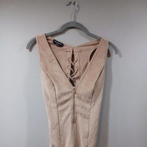 Bebe Swede tan body suit with lace up back, sleeveless, zip up front